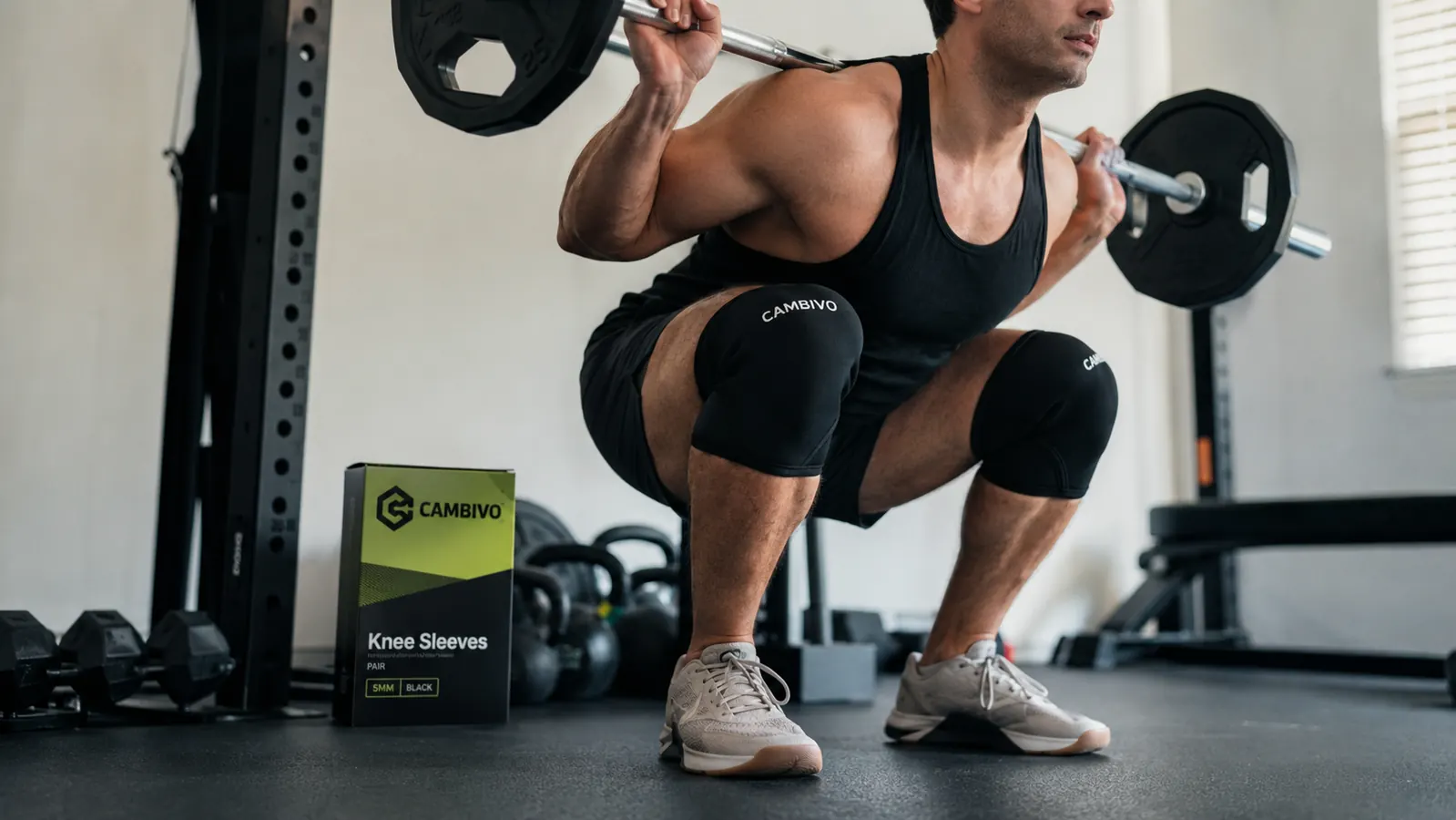 CAMBIVO compression knee sleeve being worn during a squat at the gym